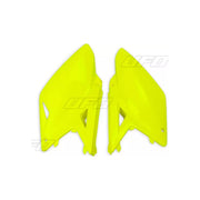 Komplet plastikowych osłon bocznych tylnych UFO Suzuki RMZ 250 10-18 żółty Fluo